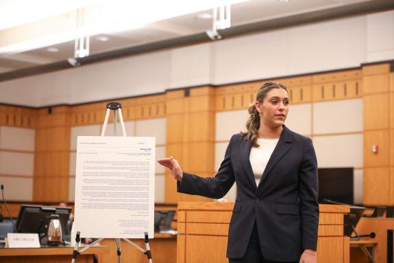 Law student competing in a trial advocacy competition.