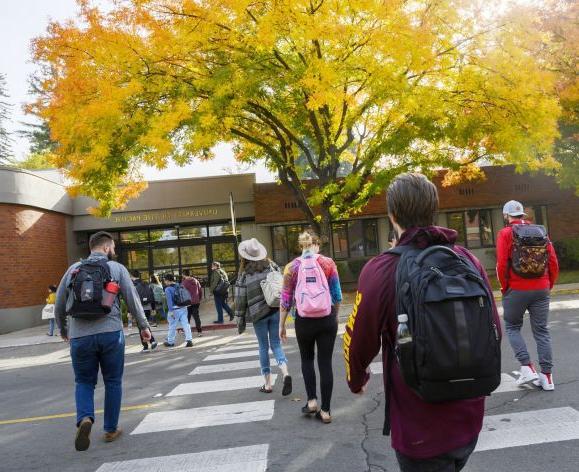students walk to class on the Sacramento campus